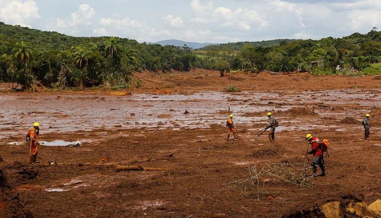 Rescuers in Brumardinho, Brazil, after a dam collapses at the Corrego do Fejau iron ore mine