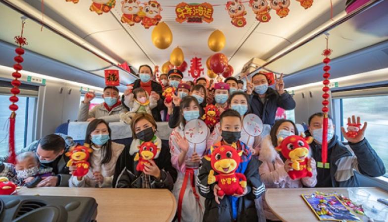 Train compartment decorated in RMB, source